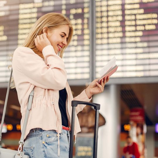 beautiful-girl-standing-airport-min